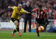SUNDERLAND, ENGLAND - DECEMBER 17:  Patrick van Aanholt of Sunderlandvies with Nordin Amrabat of Watford during the Premier League match between Sunderland and Watford at Stadium of Light on December 17, 2016 in Sunderland, England. (Photo by Ian MacNicol/Getty Images)